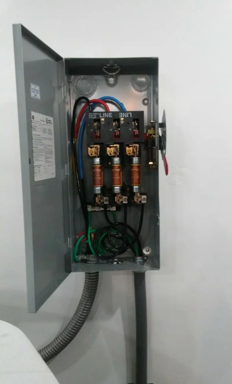 Three-phase disconnect switch installed for Smoke Detector Installation in Air Force Academy